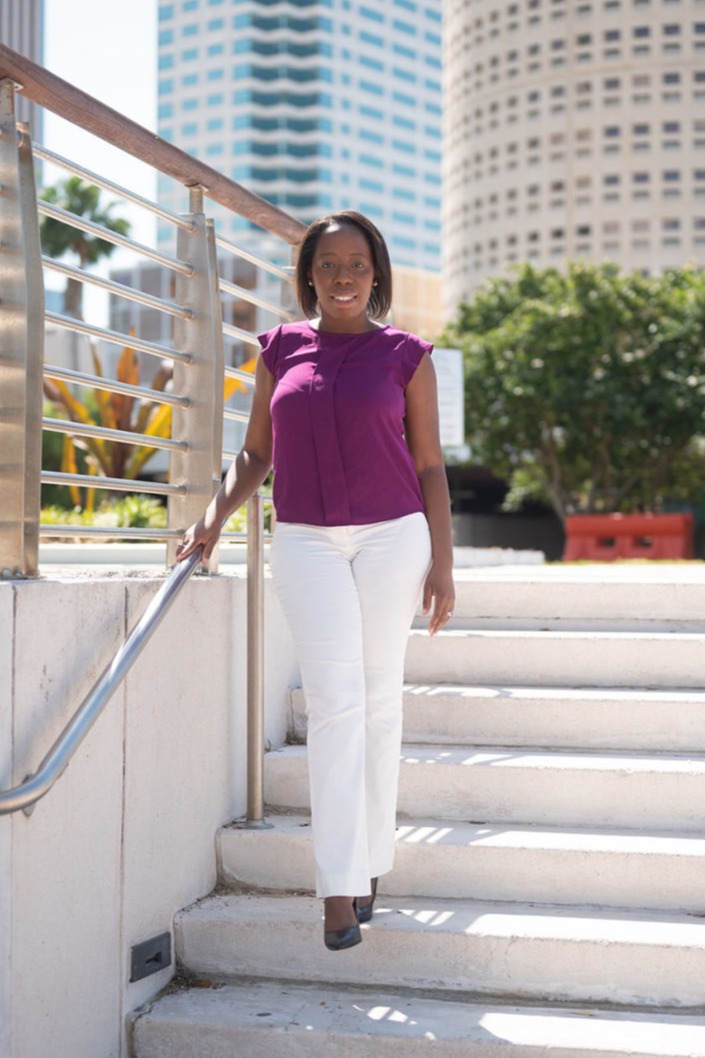 Kelly walking down stairs